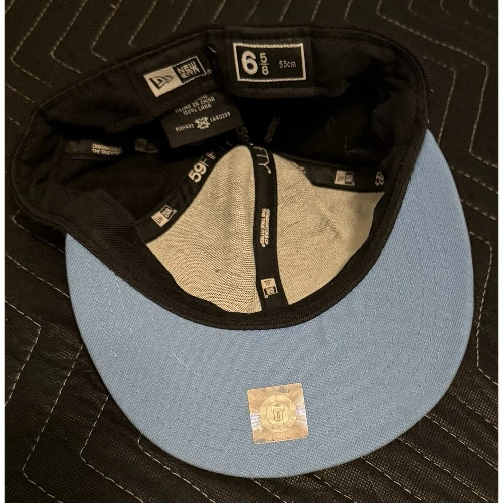 New Era 59FIFTY Fitted Hat Cap Kids Size 6 5/8 North Carolina Tar Heels Swirl